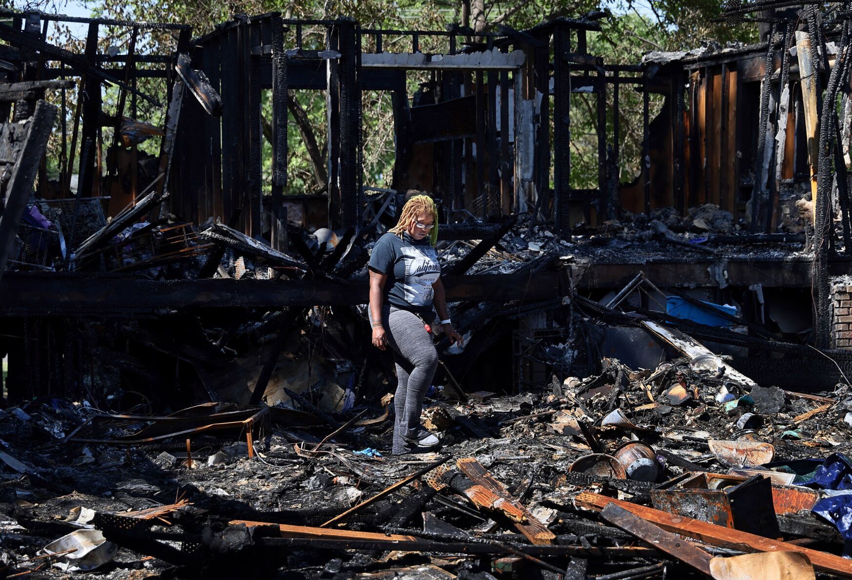 Two men charged with murder in home explosion